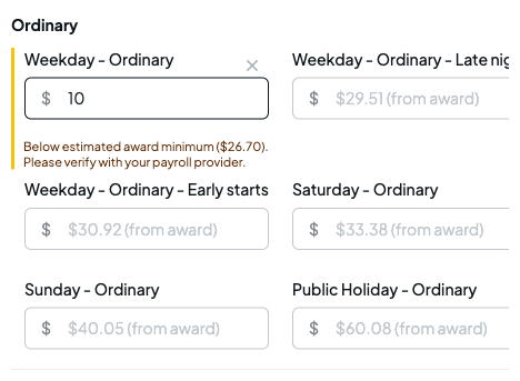 A rate override set below the award rate, showing a below estimated award minimum warning and a clear action
