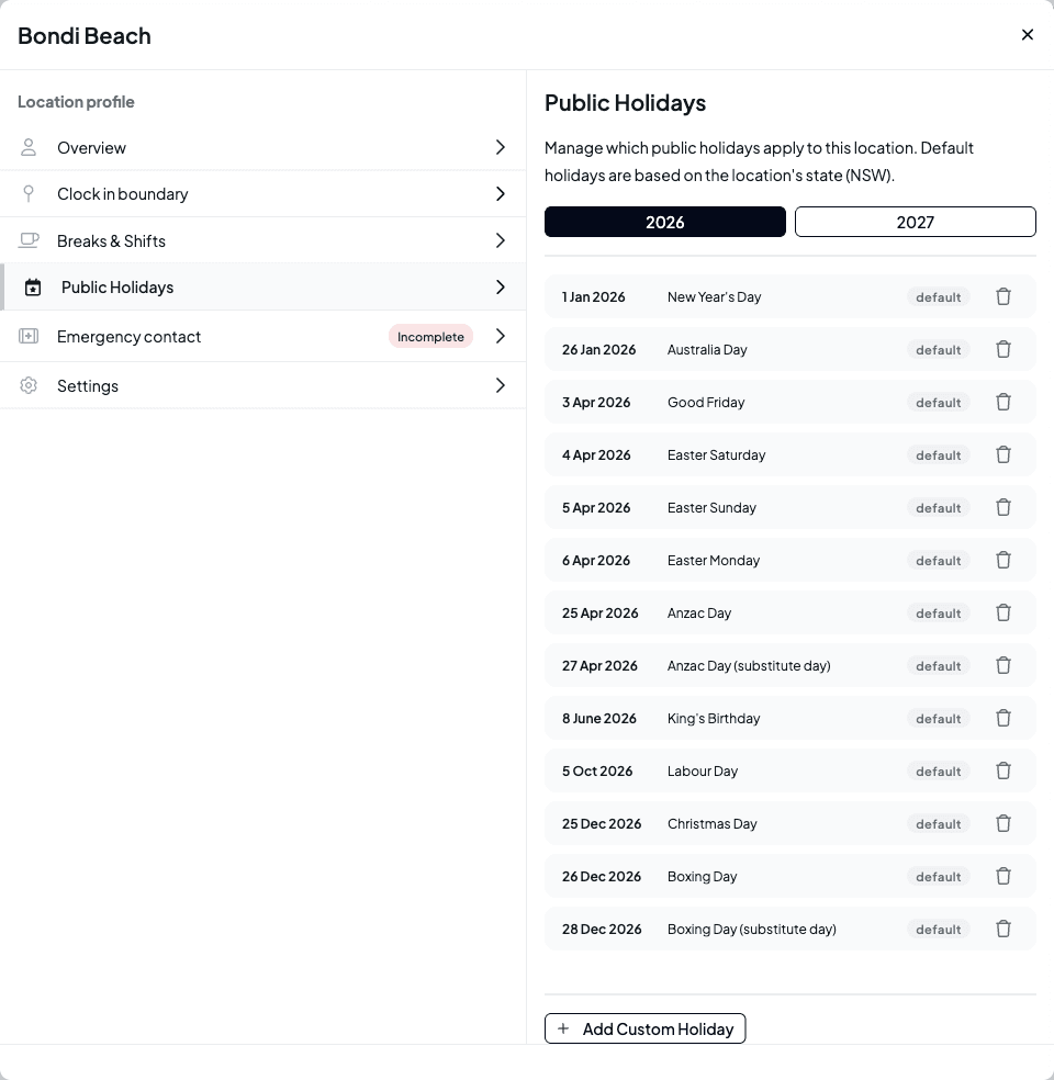 The Public Holidays tab of the Bondi Beach location editor, listing the NSW default public holidays for 2026, each tagged Default, with a year toggle and an Add Custom Holiday button