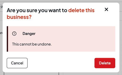 The delete business confirmation warning that this cannot be undone, with Cancel and Delete buttons